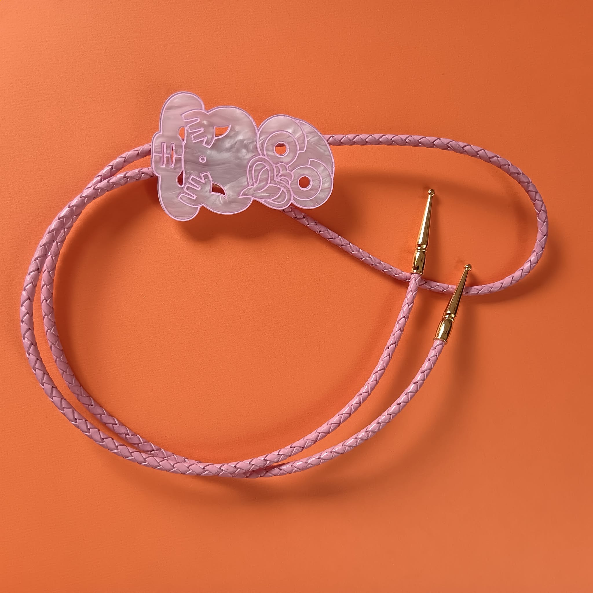 TIKI BOLO TIE - PINK LEATHER CORD