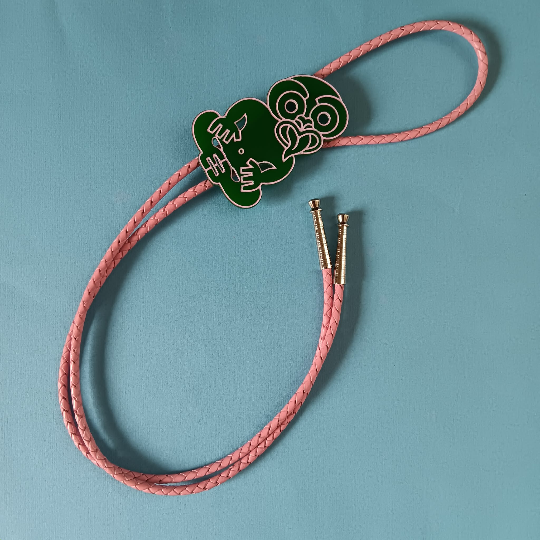 TIKI BOLO TIE - PINK LEATHER CORD