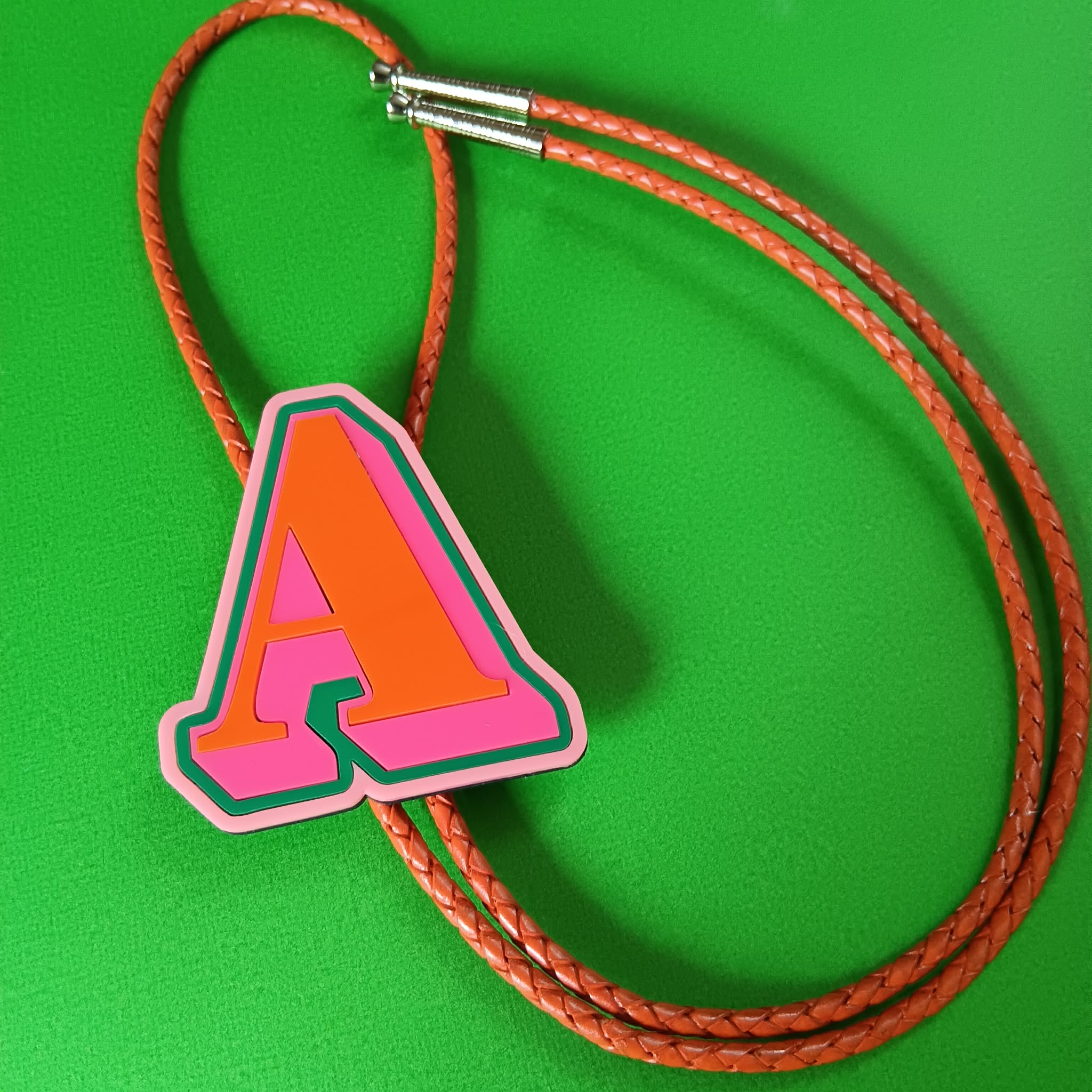 ALPHABET BOLO TIE